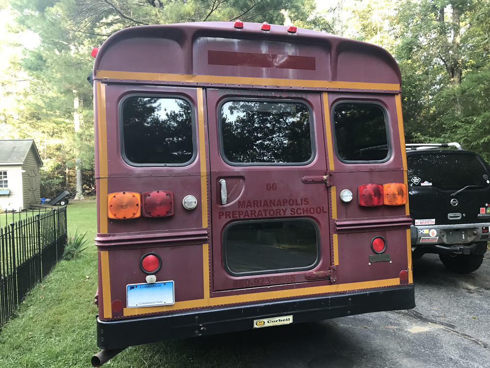 Shot of the rear of the bus from the outside.