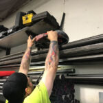 Bill cuts a piece.