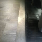 Floor transition from foyer to Grand Ballroom.