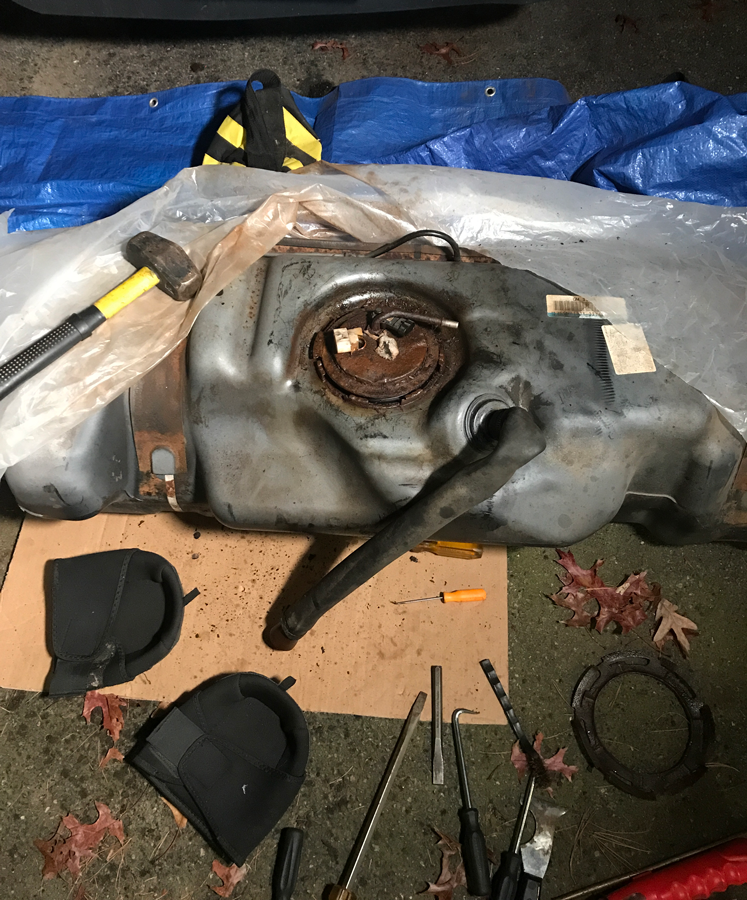 Rusty fuel pump on tank.