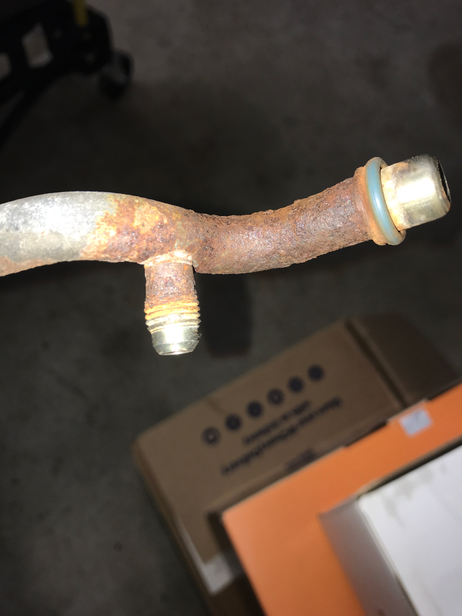 Rusty fuel tube up close.