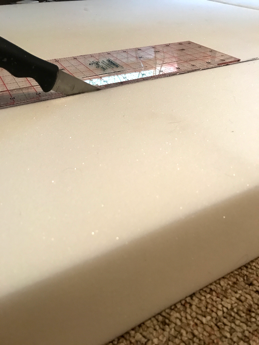 Cutting foam with a bread knife.