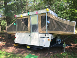 Our first camper, a pop-up.